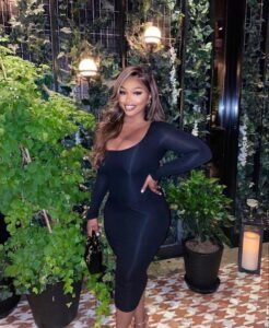 Elegant woman in black dress representing adult chat UK and phone sex chat