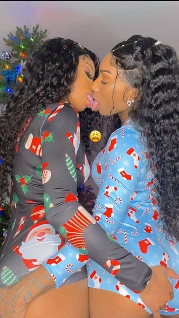 Girls on girls chat UK profile featuring two confident women Lesbian chat UK duo in matching festive outfits