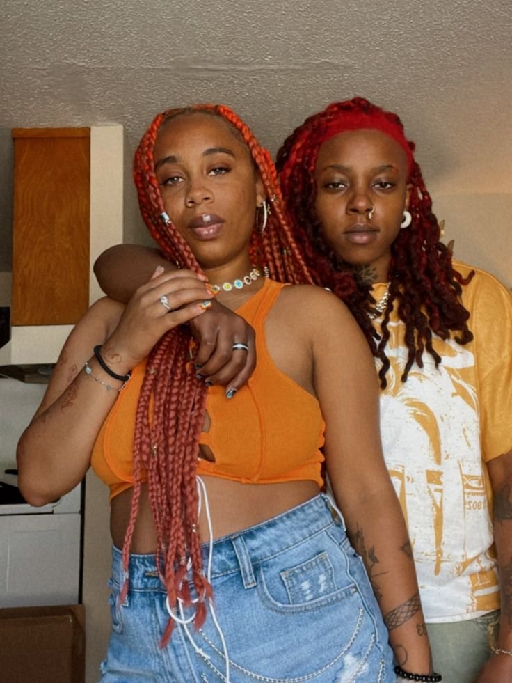 Girls on girls chat UK profile featuring two confident women Lesbian phone chat UK female duo with braided hairstyles Women seeking women chat profile in casual streetwear Girls on girls phone chat UK profile image Lesbian chat lines UK confident female pair Adult chat UK girls on girls category profile Live girls on girls chat featuring stylish women