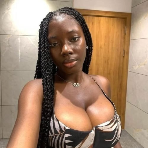 Curvy UK phone chat model Nerisse Amoura with braided hair and calm confident presence