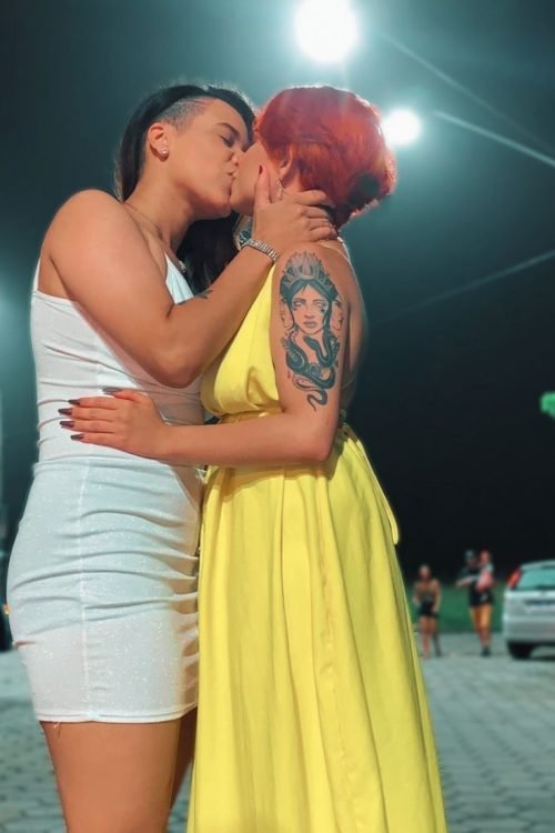 Girls on girls chat UK profile featuring two confident women Lesbian phone chat UK female couple in evening outfits Women seeking women chat profile with modern fashion Girls on girls phone chat UK profile image Lesbian chat lines UK confident female duo