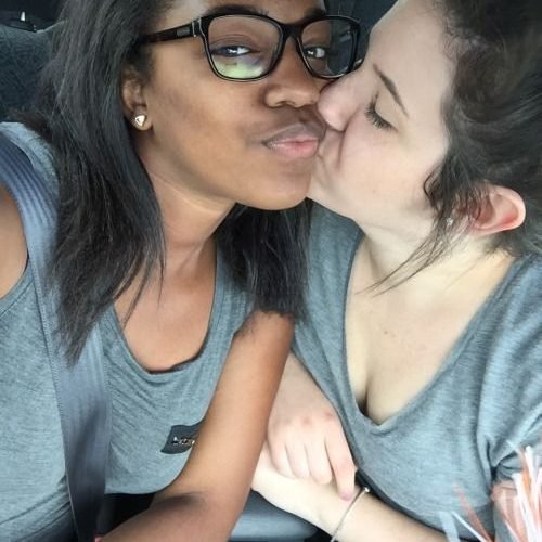 Girls on girls chat UK profile featuring two women in a car Lesbian phone chat UK female duo in casual outfits Women seeking women chat profile with natural chemistry Girls on girls phone chat UK profile image Lesbian chat lines UK confident female pair Adult chat UK girls on girls category profile Live girls on girls chat featuring friendly women