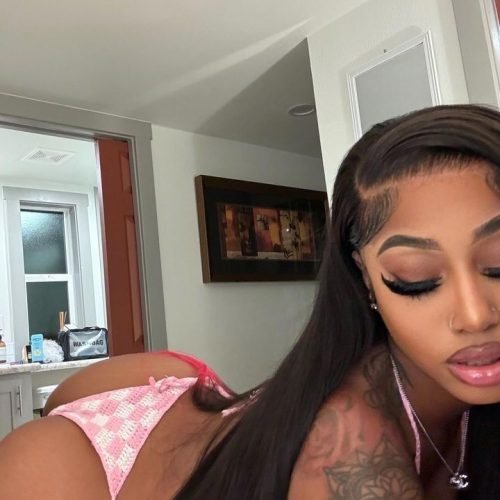 Intimate curvy UK phone chat model Veloura Nyxen with long dark hair and seductive confident presence