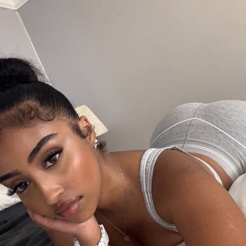 Elegant curvy woman with calm dominant expression