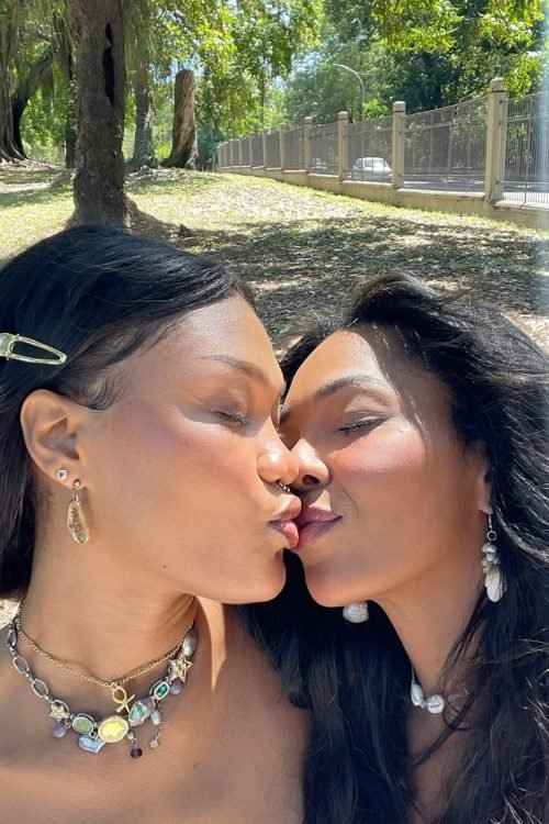 Girls on girls chat UK profile featuring two women outdoors Lesbian phone chat UK female duo in a park Women seeking women chat profile with elegant casual style Girls on girls phone chat UK profile image Lesbian chat lines UK confident female pair Adult chat UK girls on girls category profile