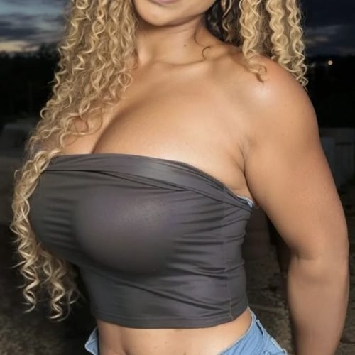 Curvy woman smiling outdoors representing phone sex chat UK and adult chat with horny girls